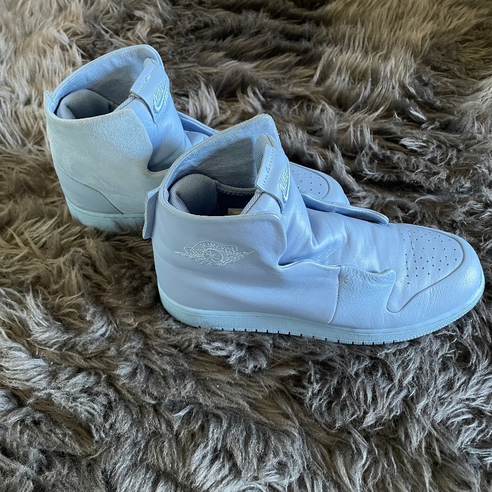 Carolina blue high top Air Jordan sneakers